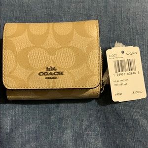 Beige Coach Tri-Fold Wallet